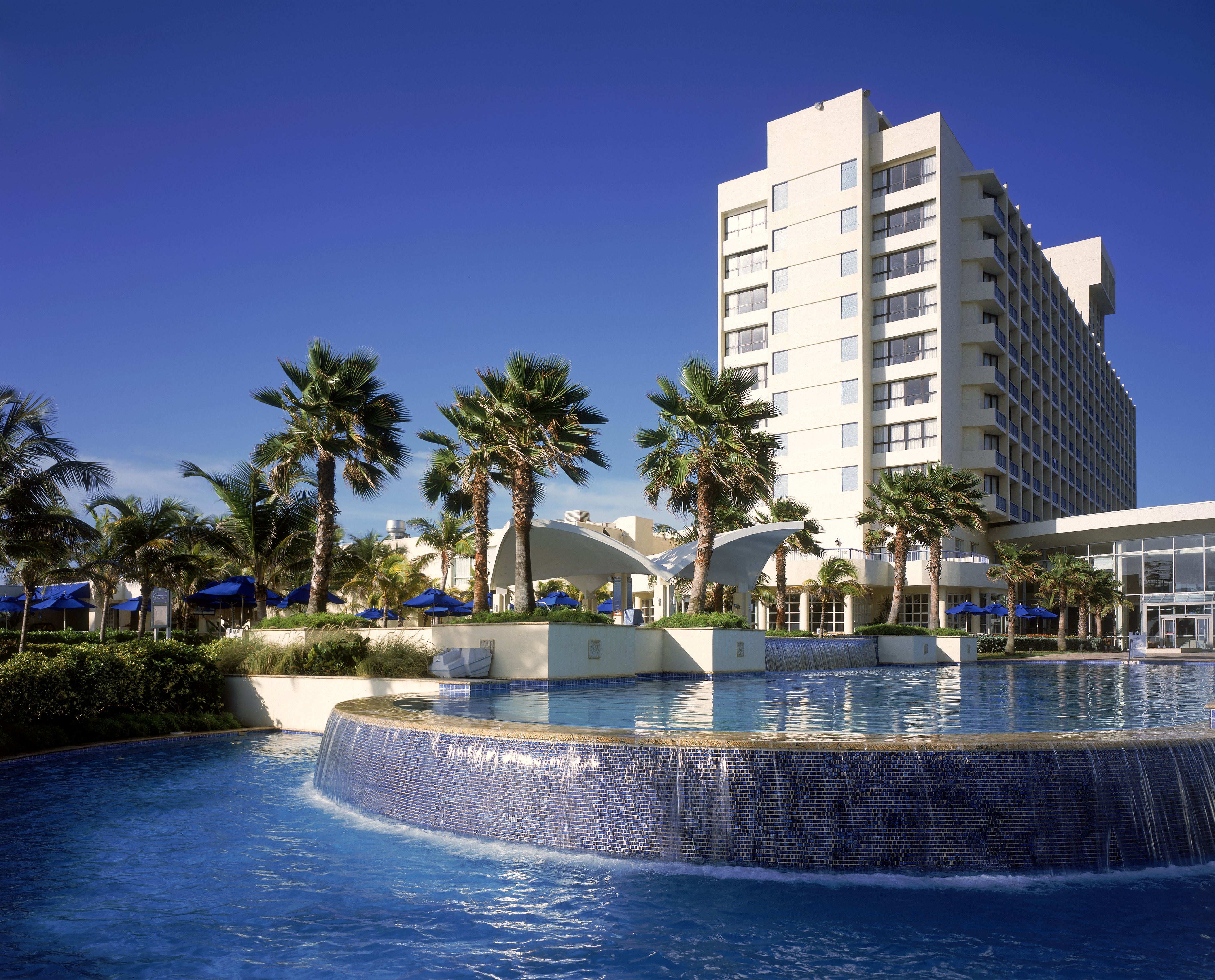 Palm trees and fountain outside the Caribe Hilton in San Juan, Puerto Rico. 