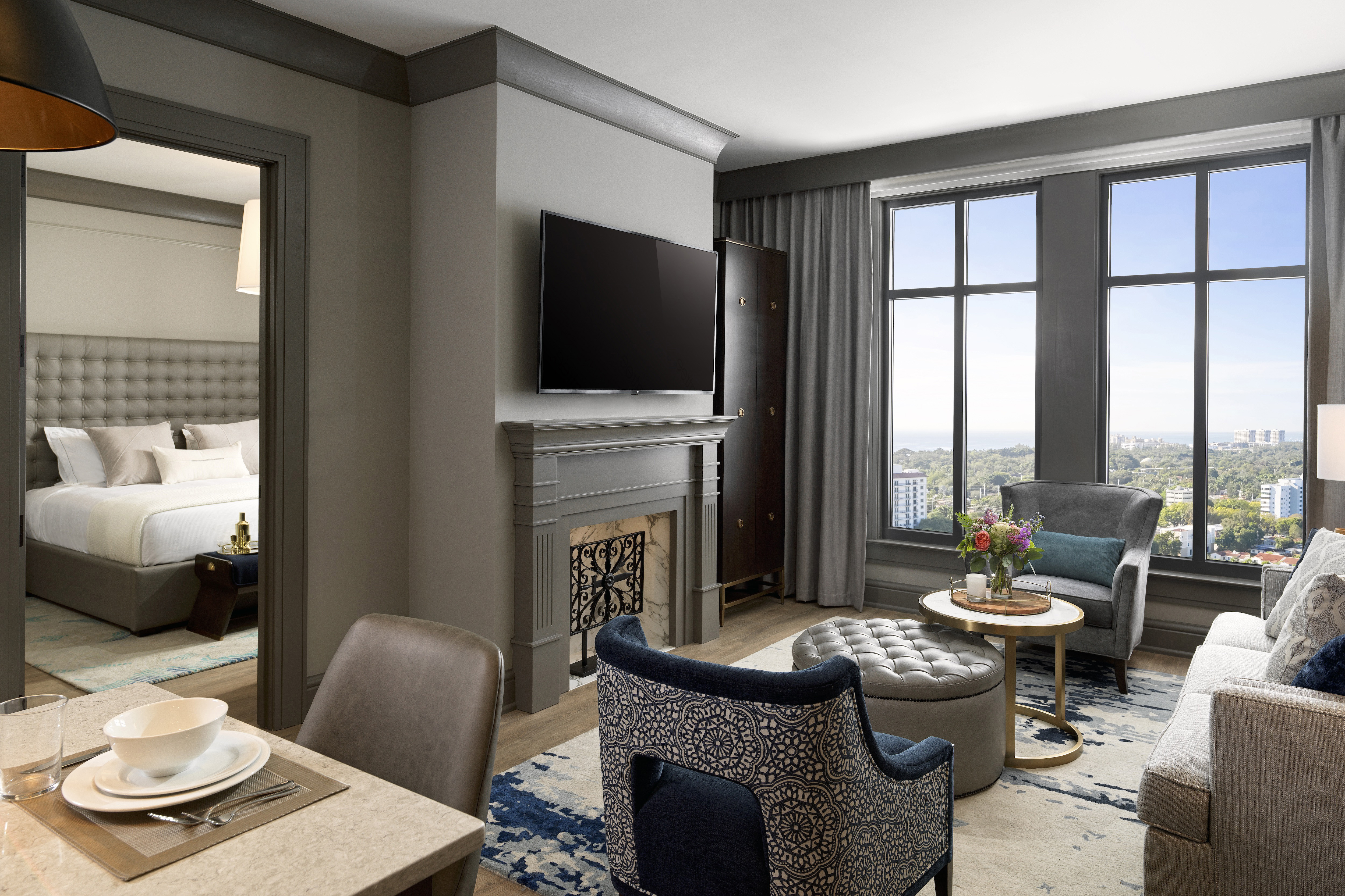 1-bedroom suite interior view, including living room and kitchen at Liberty Place Charleston by Hilton Club in South Carolina. 