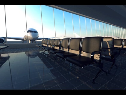 Interior shot of empty air port with plane parked outside window. 