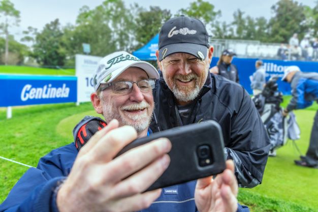 Fan snapping selfie with celebrity, Hilton Grand Vacations Tournament of Champions, Orlando, Florida. 