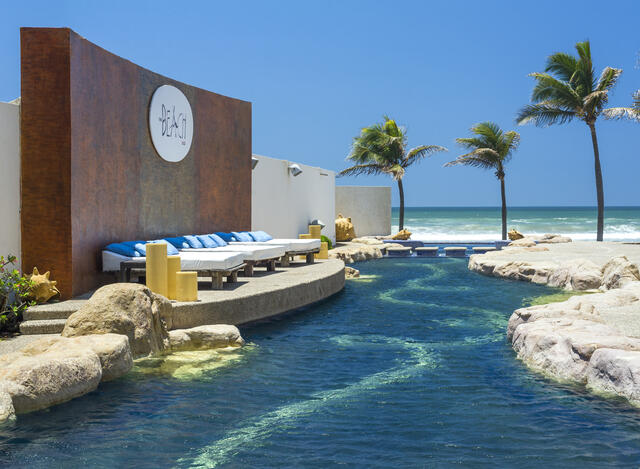 Beautiful poolside scene, The Grand Mayan Acapulco, Mexico.