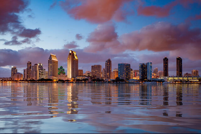 San Diego skyline, dusk colored clouds overhead, California, 