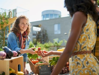 Two women at a farmers market