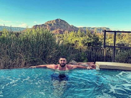 A Hilton Grand Vacations Owner at the pool of Sedona Summit, a Hilton Grand Vacations Club