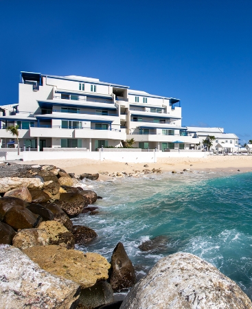 Flamingo Beach, a Hilton Vacation Club sits on the Caribbean beach.